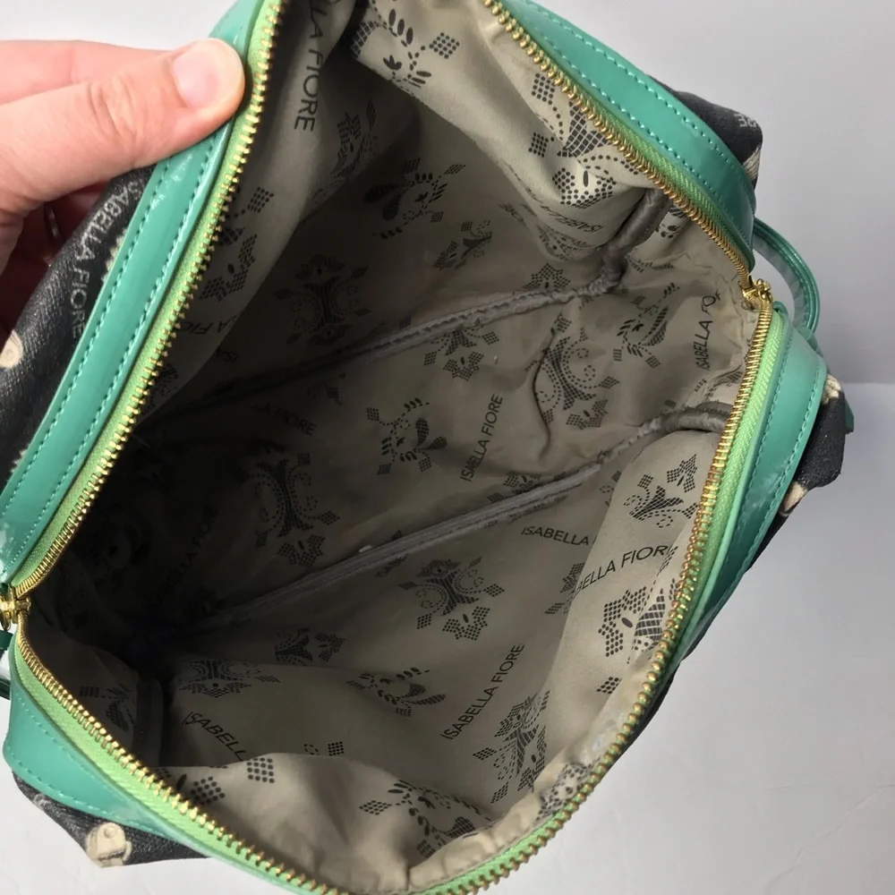 Isabella Fiore black and teal tassels make up bag